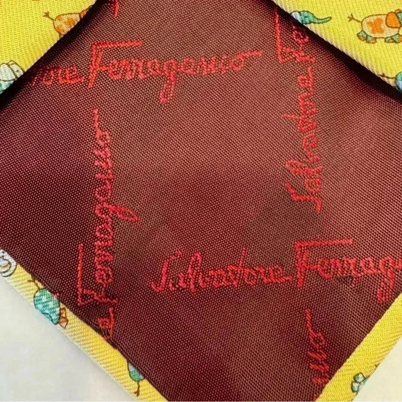Salvatore Ferragamo luxury yellow silk tie with small whimsical elephant print. - Picture 6 of 11